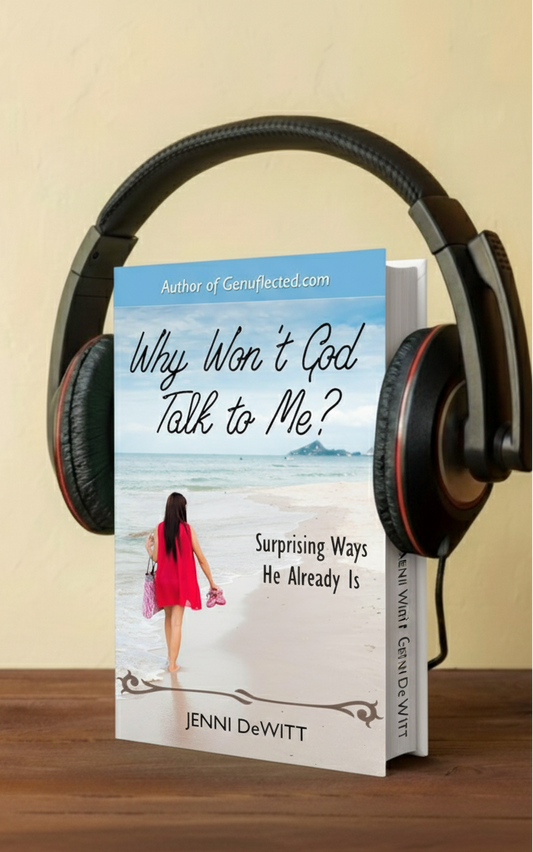Audiobook titled "Why Won't God Talk to Me?" by Jenni DeWitt with headphones on a wooden surface.